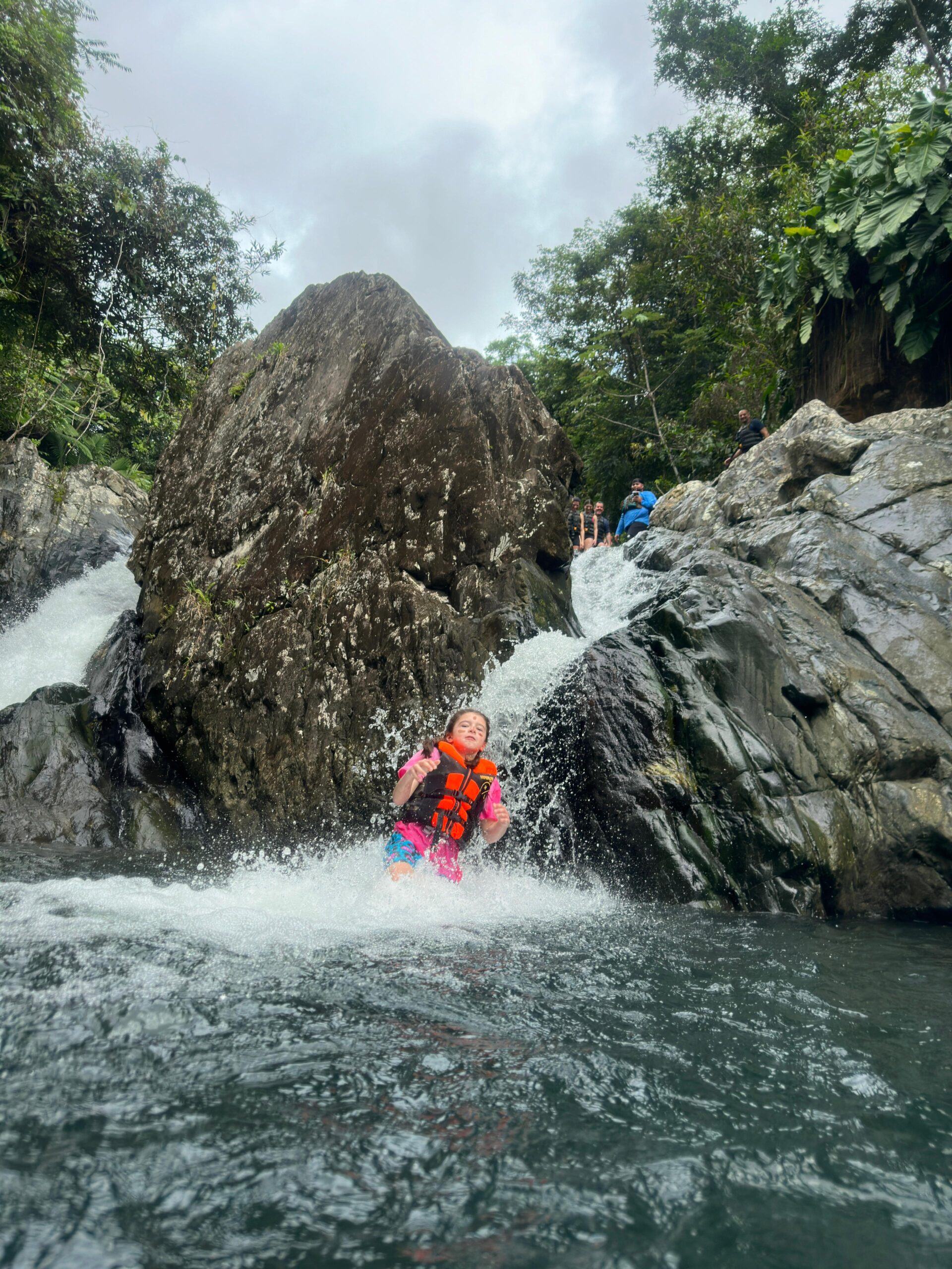 Natural water slide in El Yunque Rainforest hidden swimming hole Puerto Rico