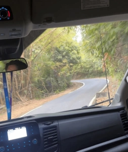 Scenic winding road to El Yunque Rainforest through Puerto Rico mountains